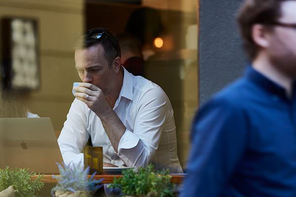 Man working in coffee shop.
